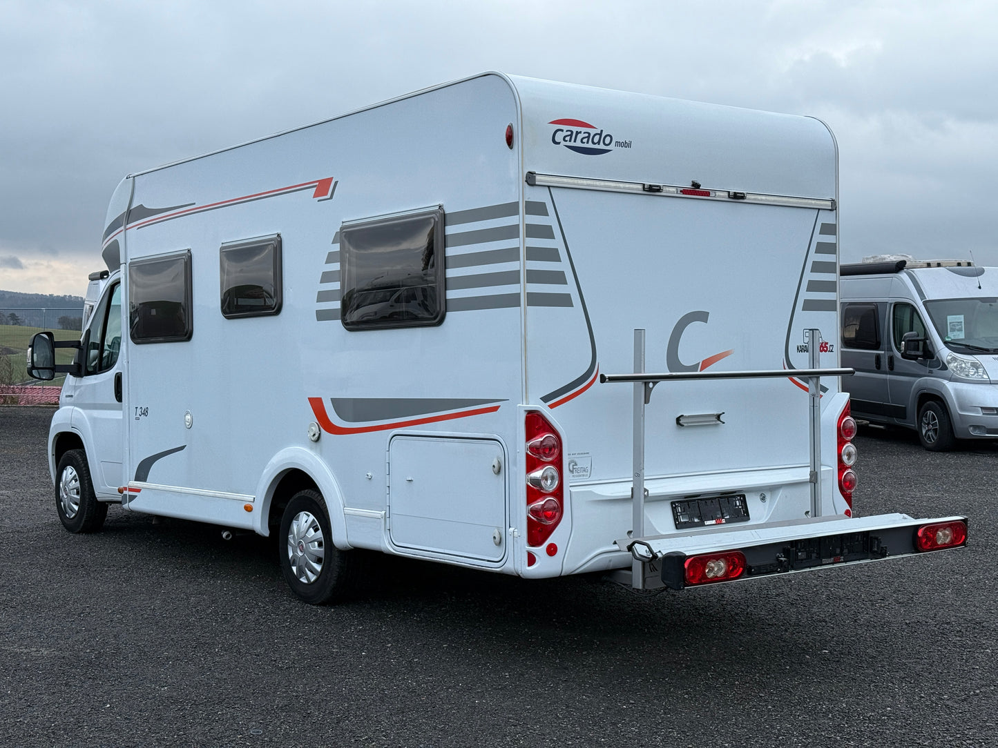 Carado T348, sjížděcí postel, 2012, držák na motorku, Truma
